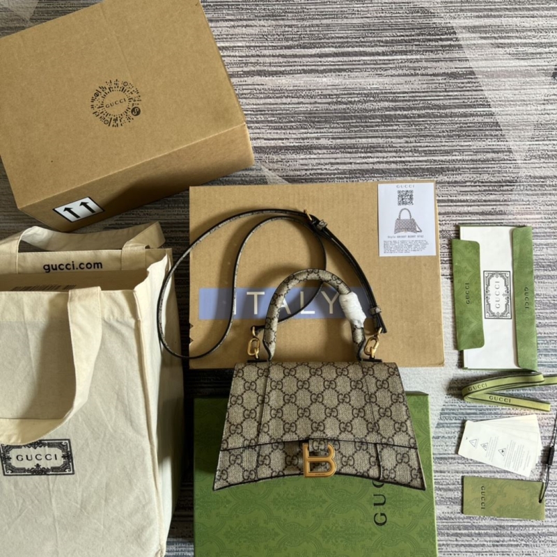 G*u*i top handle bags